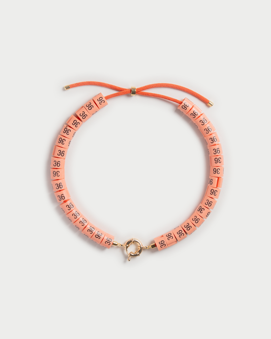 Necklace Ama in colors peach to keep you warm and relaxed