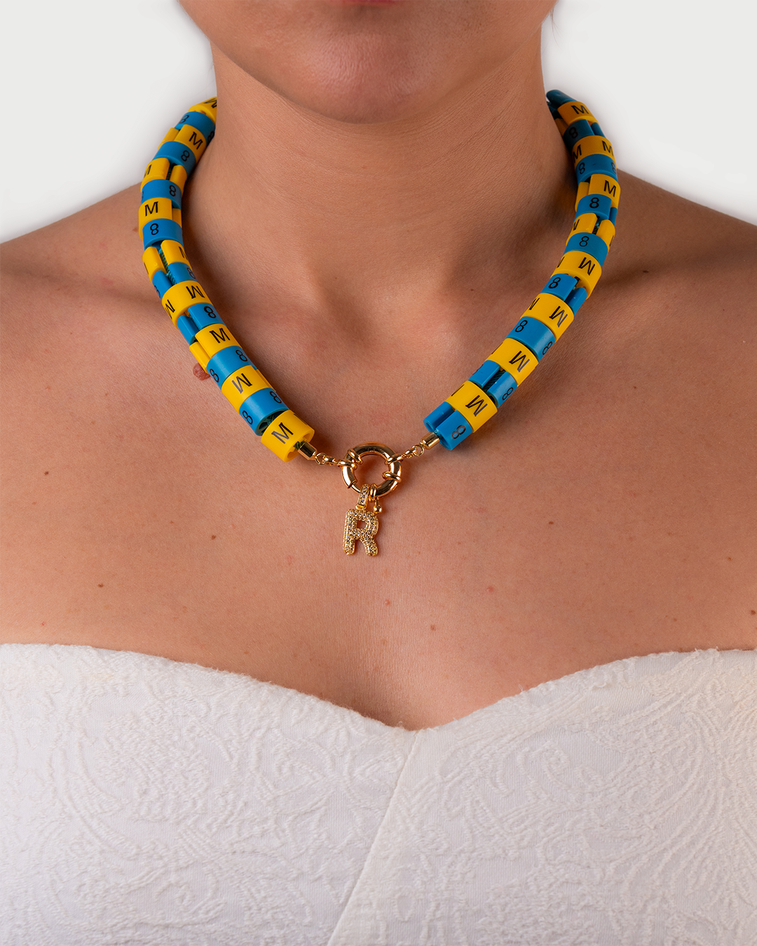 Necklace Apollo with slim pendant in colors yellow and blue inspired by the blue sky bliss