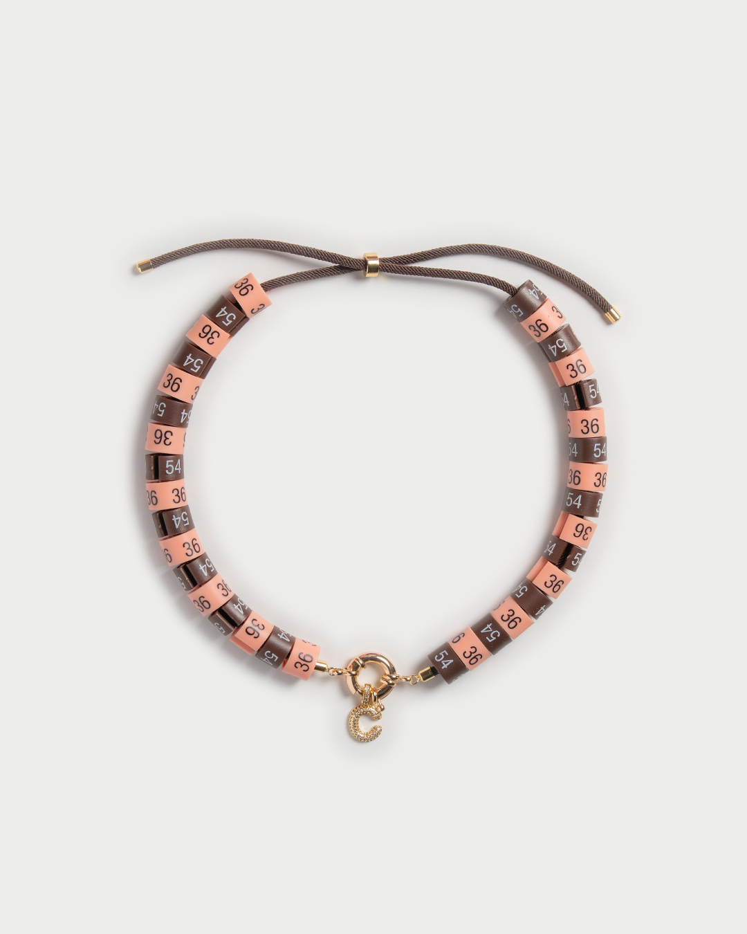Necklace Diana with slim pendant in colors peach and brown - channeling the huntress' energy and Lady D elegance