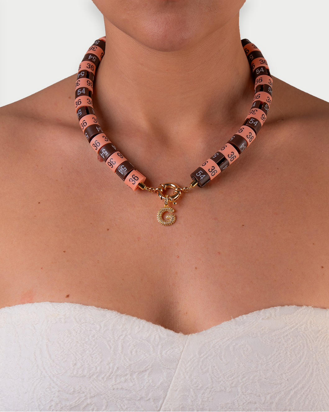 Necklace Diana with slim pendant in colors peach and brown - channeling the huntress' energy and Lady D elegance