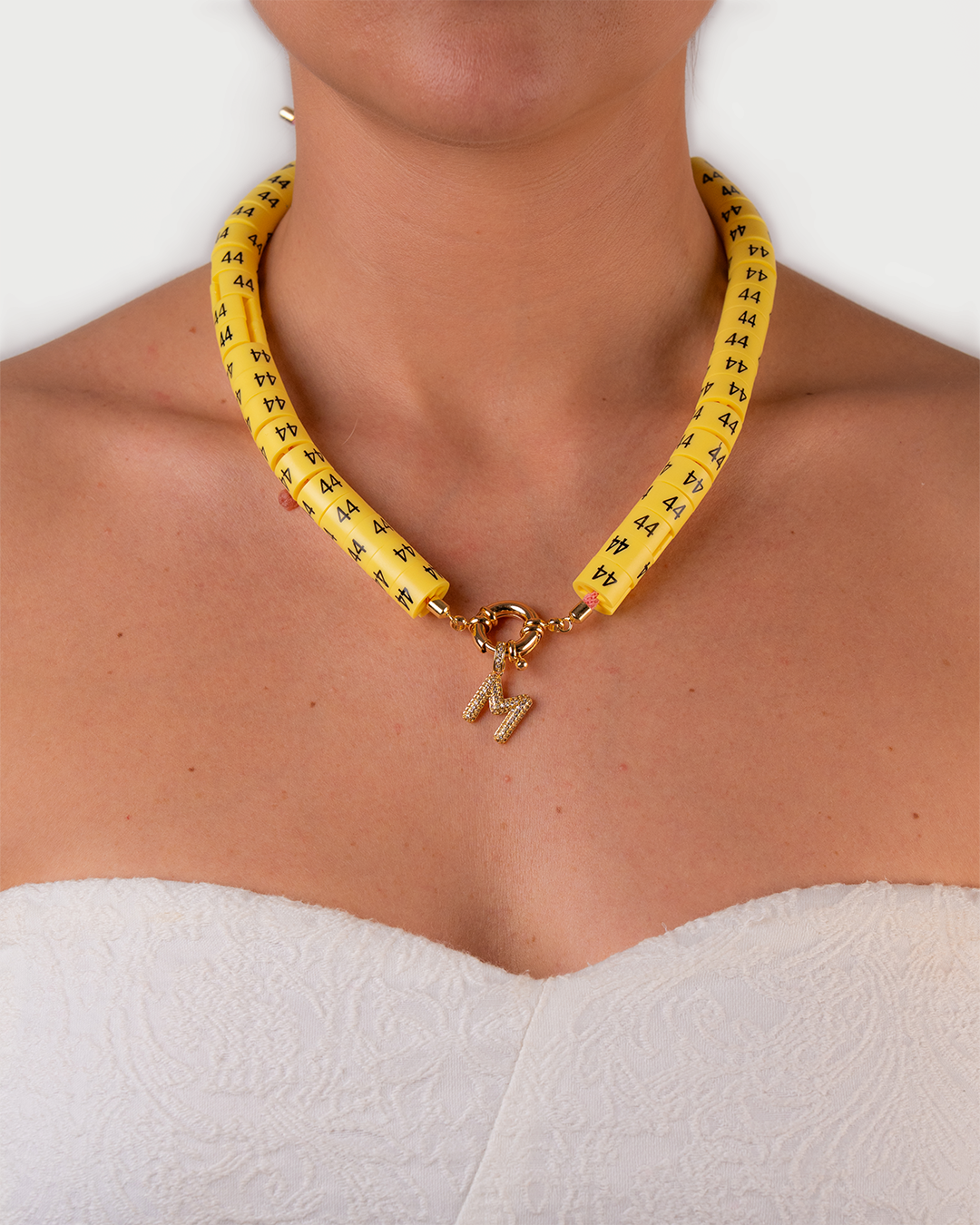Necklace Dora in color yellow burro with slim pendant to activate your inner energy