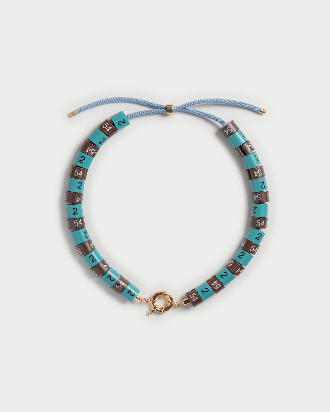 Necklace Era in colors turquoise and brown embody strength with a cool vibe