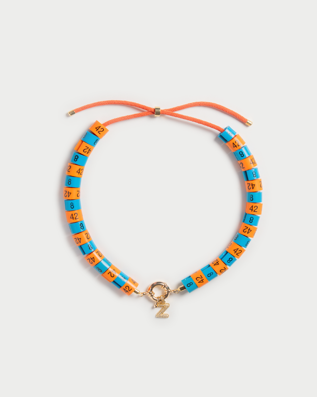 Necklace Helios in colors orange and blue with slim pendant inspired by the God of the sun
