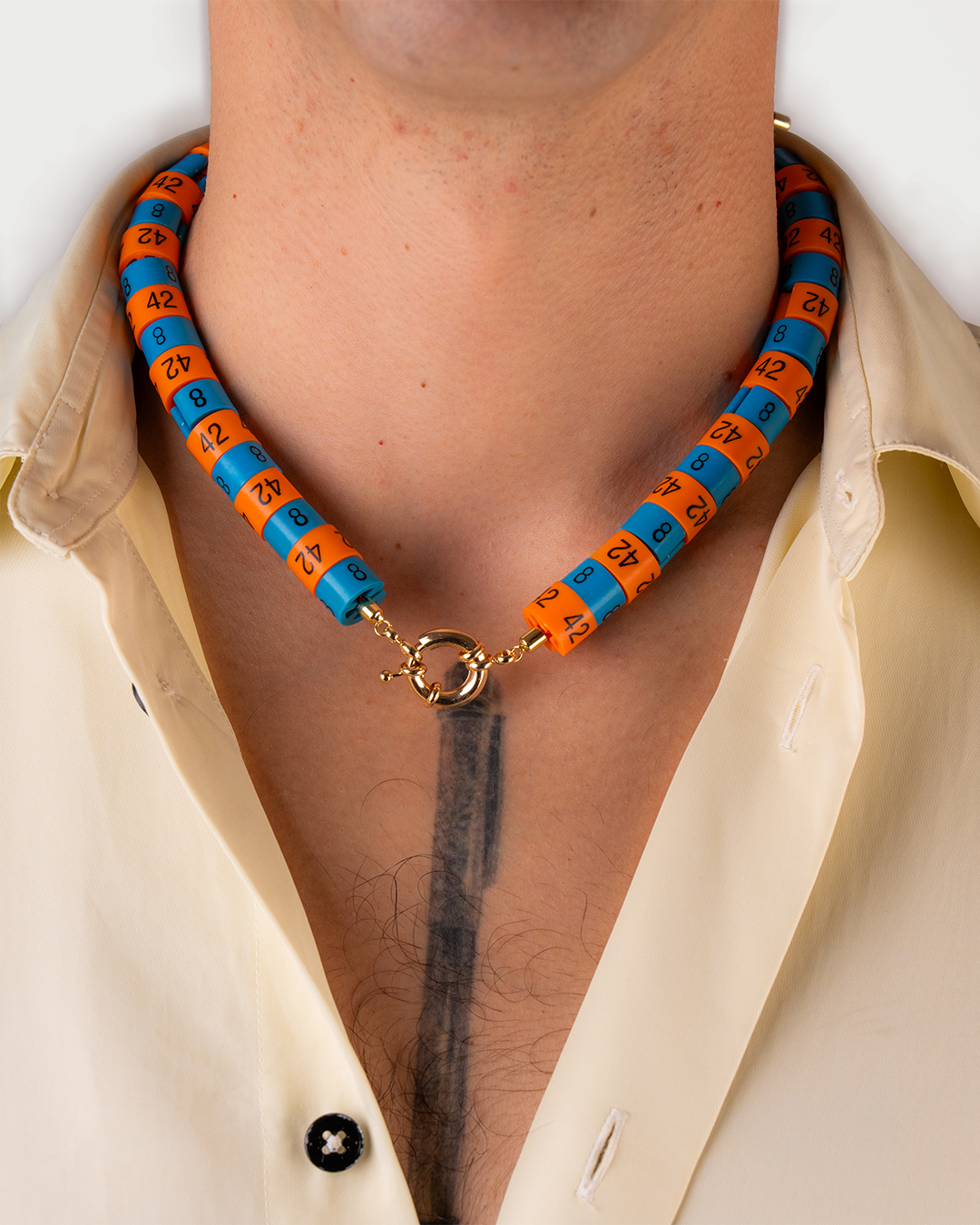 Necklace Helios in colors orange and blue with bold pendant inspired by the God of the sun