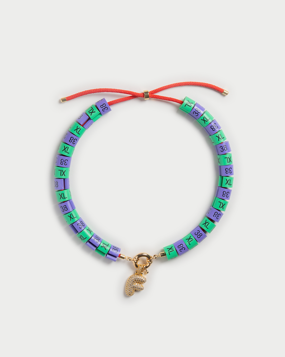 Necklace Inka with bold pendant in colors green and purple - where the ocean meets wild nature