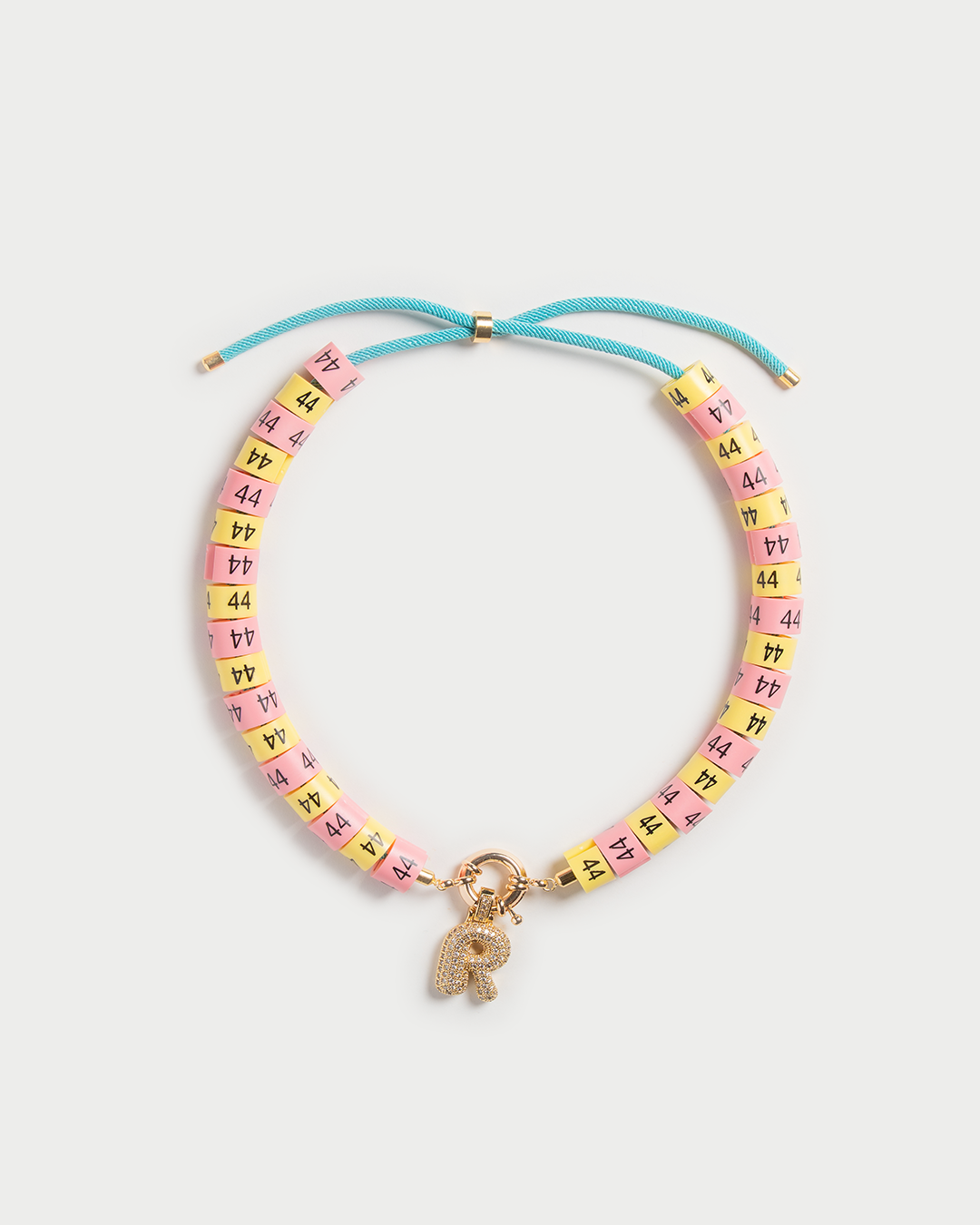 Necklace Luma in colors yellow and pink inspired by the sun with bold pendant