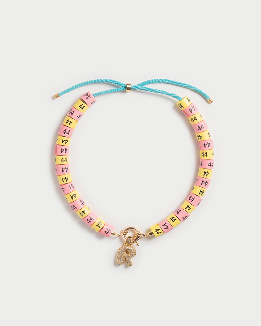 Necklace Luma in colors yellow and pink inspired by the sun with bold pendant