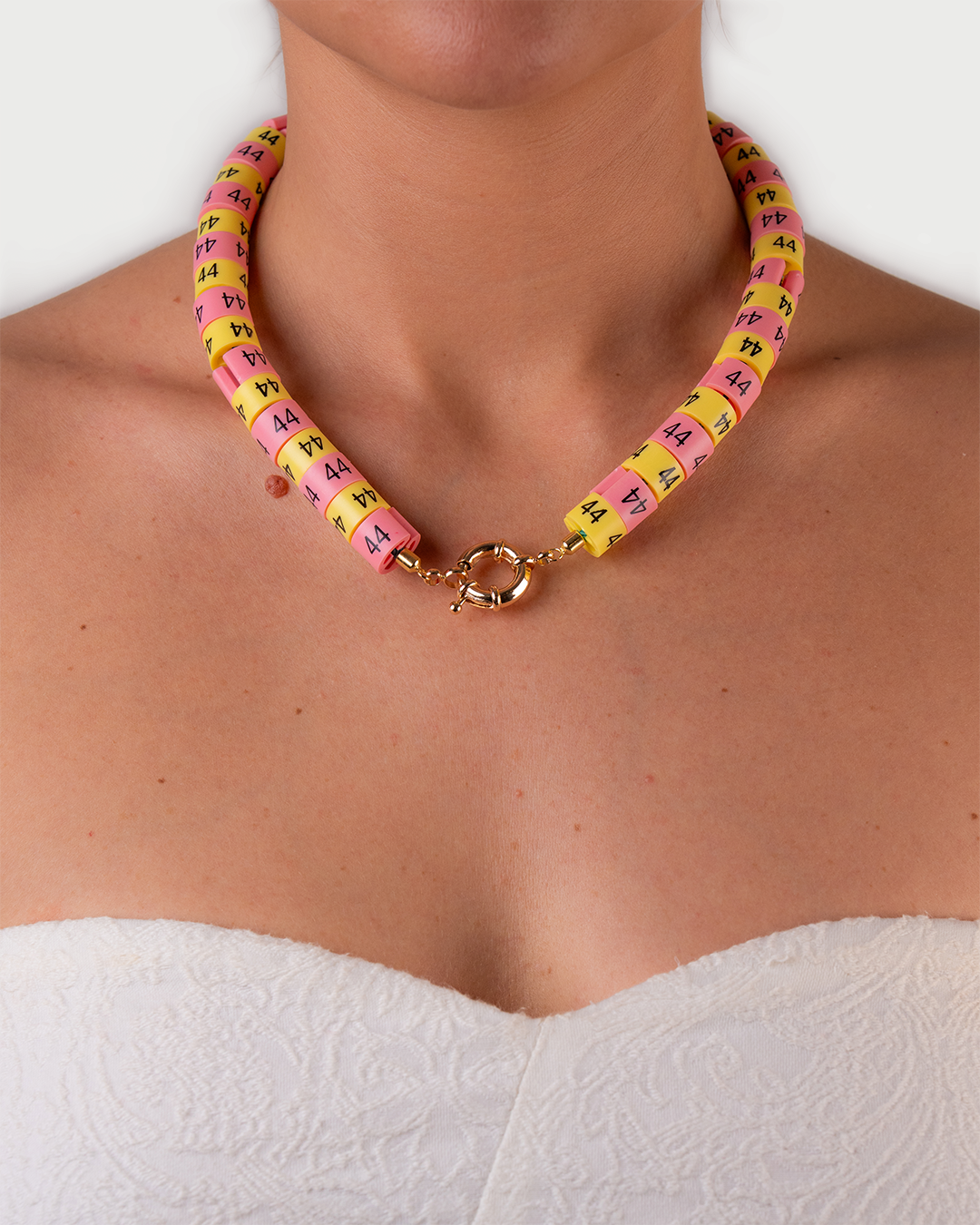 Necklace Luma in colors yellow and pink inspired by the sun 