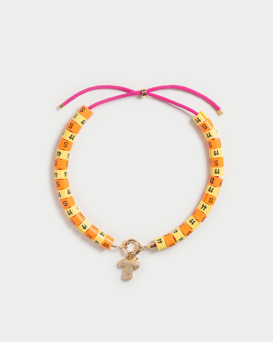 Necklace Raya with bold pendant in colors butter yellow and orange radiate golden hour energy and serenity
