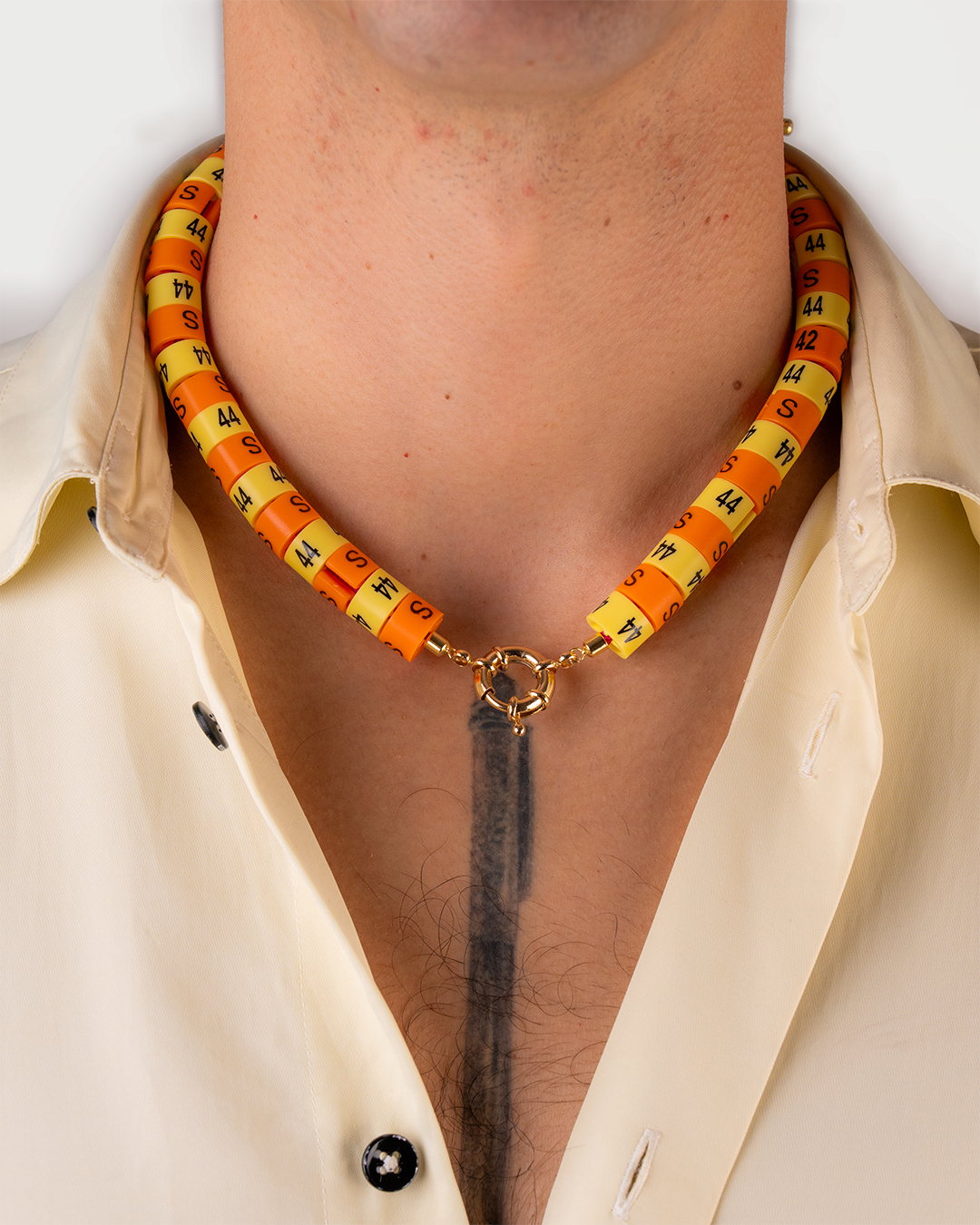 Necklace Raya in colors butter yellow and orange radiate golden hour energy and serenity
