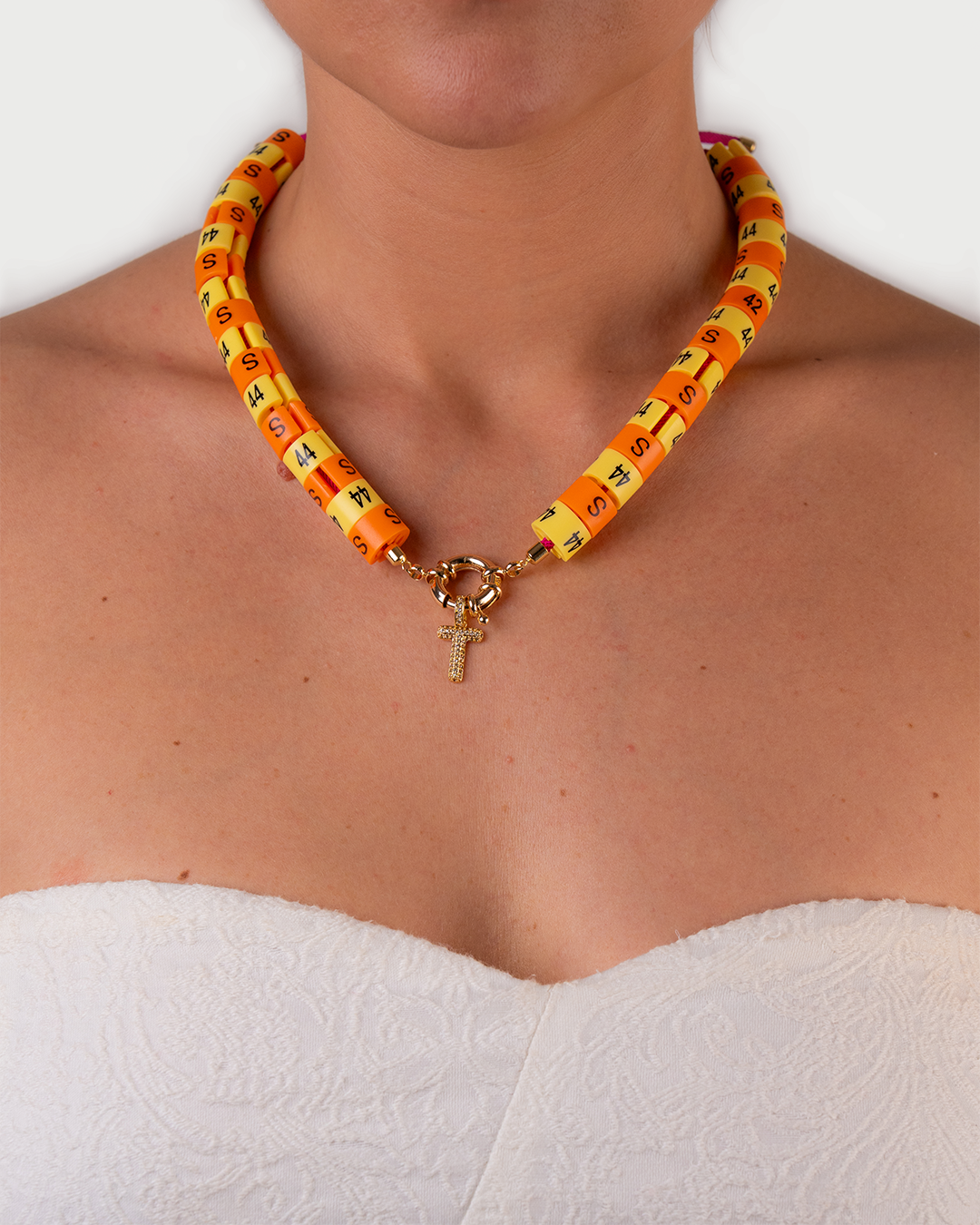 Necklace Raya with slim pendant in colors butter yellow and orange radiate golden hour energy and serenity