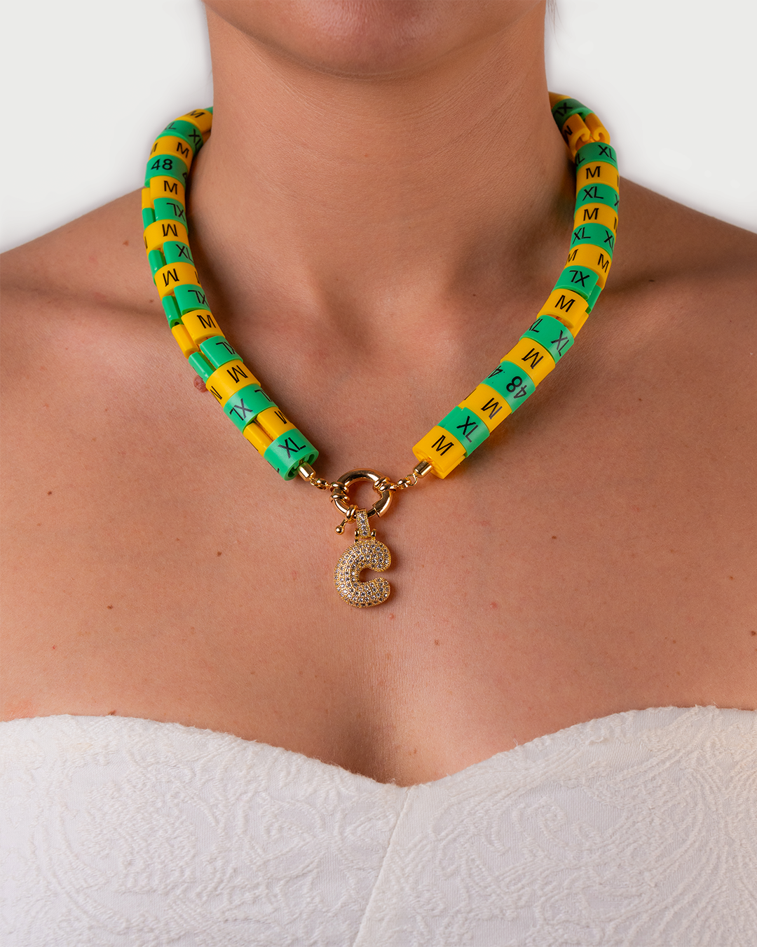 Necklace Solea with bold pendant  in colors yellow and green to embody the Brazilian alegria