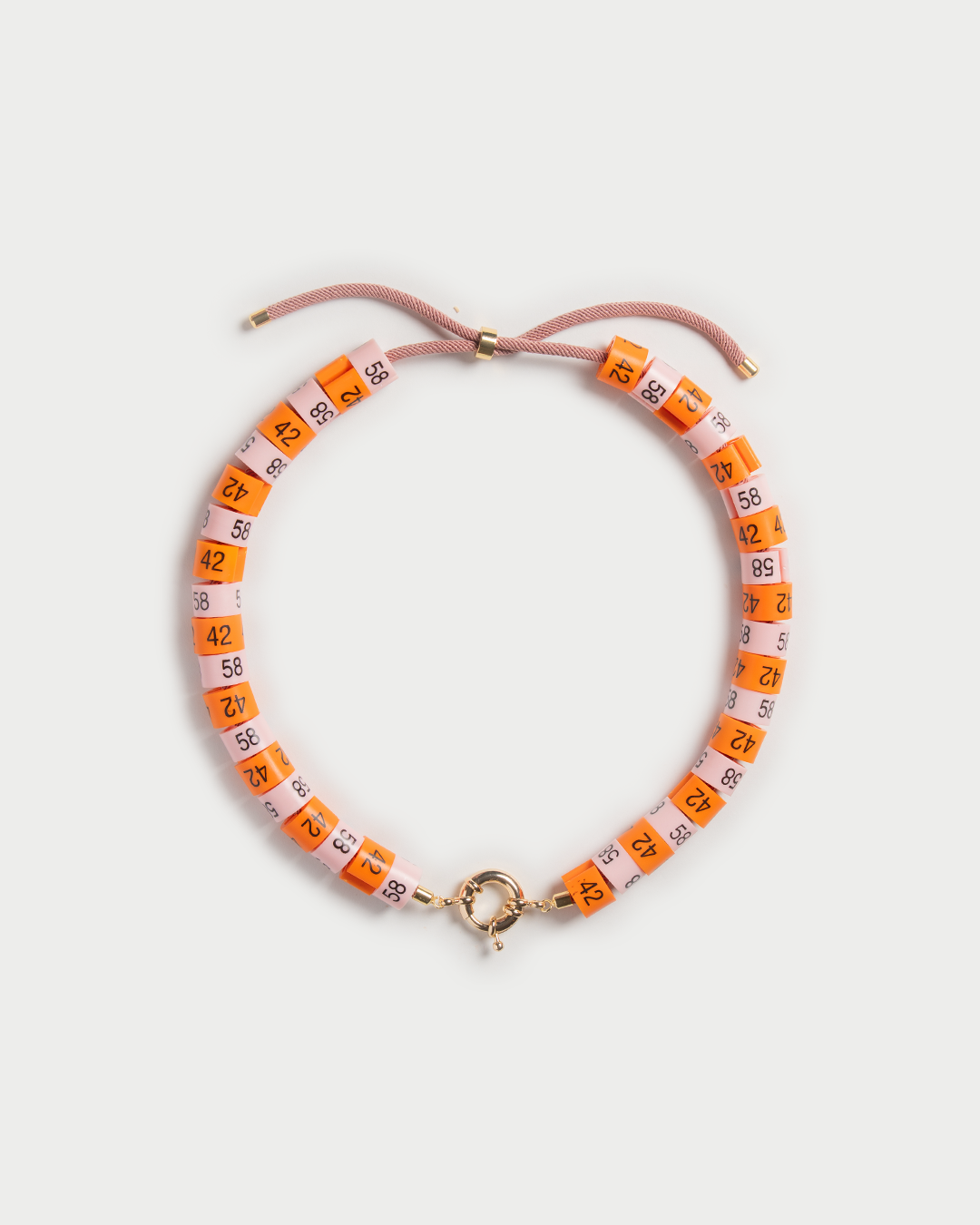 Necklace Soraya in colors orange and baby pink inspired by the sunset