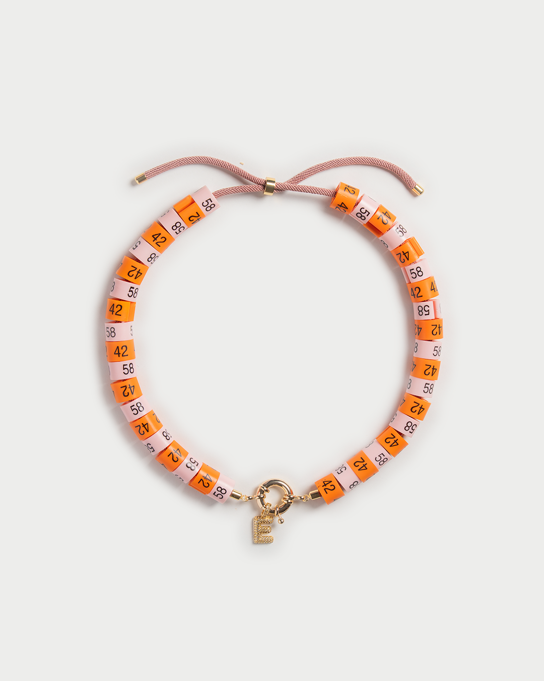 Necklace Soraya with slim pendant in colors orange and baby pink inspired by the sunset